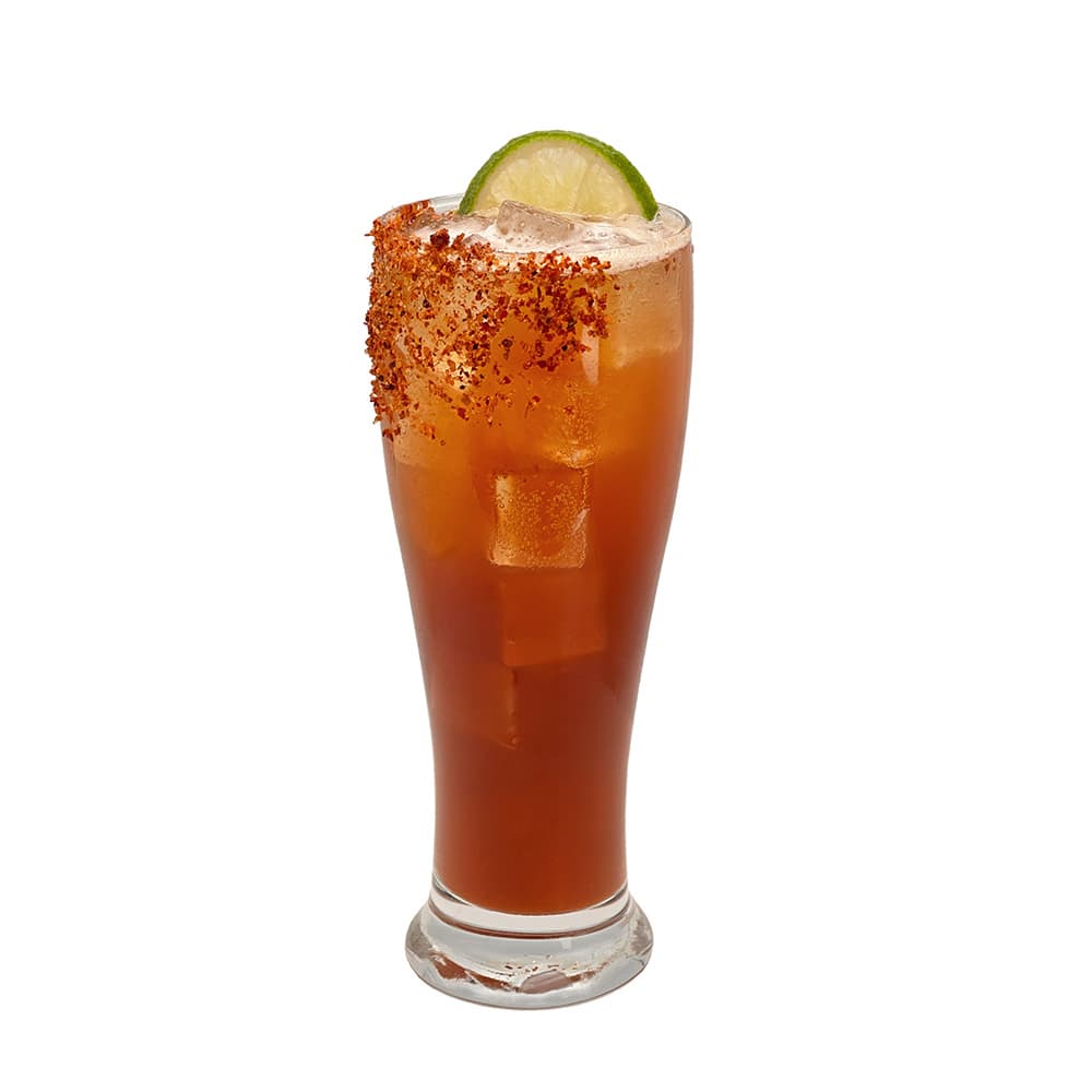 Atmosphere Pilsner Michelada cocktail with a lime wedge on a white background.